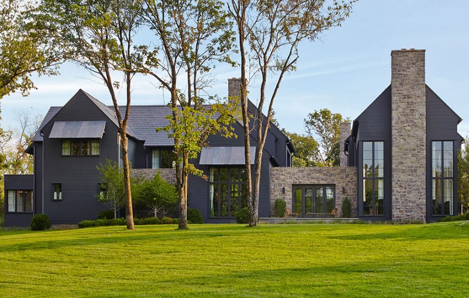 A warm brick home at dusk in Nashville, Tennessee